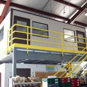 An office installed on the second floor of a warehouse