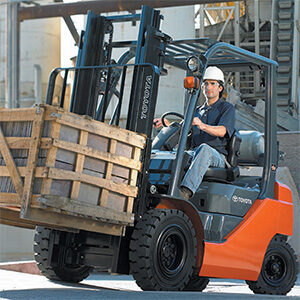 Toyota IC Pneumatic Forklift driving up a ramp