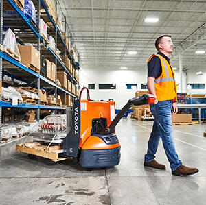 Toyota Electric Pallet Jack guided in a warehouse