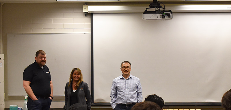 Kwang, Barb, and Rocky speaking to the Automotive class.